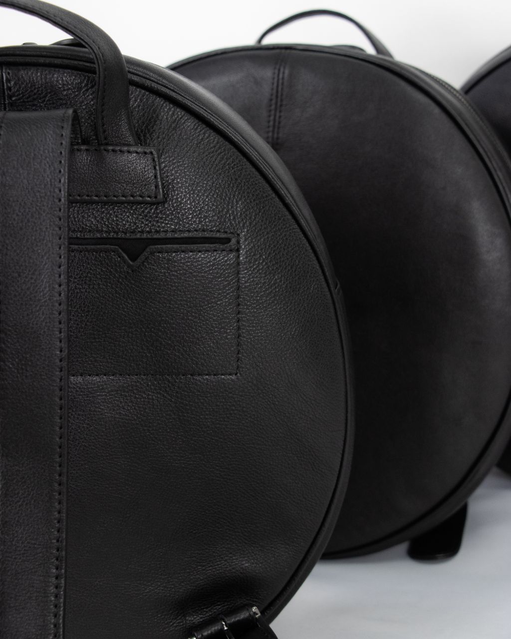 black leather backpack round flap Luna Full Moon Round Leather Backpack