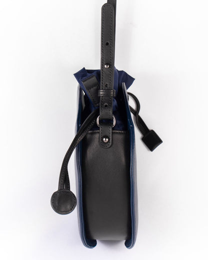 midnight blue combo leather bag with nylon beans bag side view