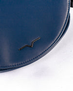 navy circle leather bag close up top