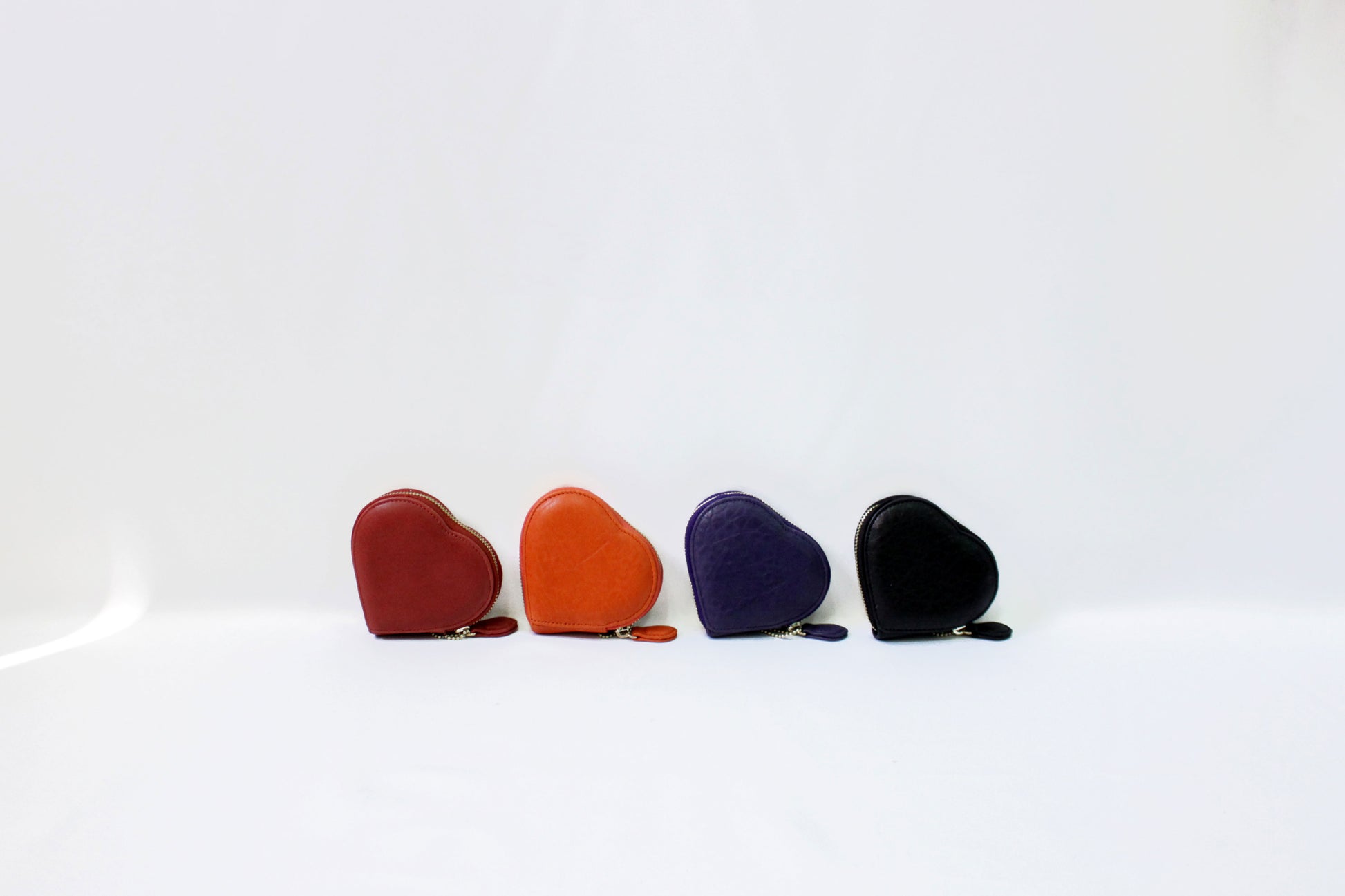 TAT_smallleathergoods_heartpurse_2283_red orange blue black full collection