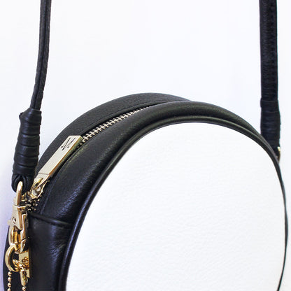 TAT_whysoserious_crossbody_14588-shoulder belt close up
