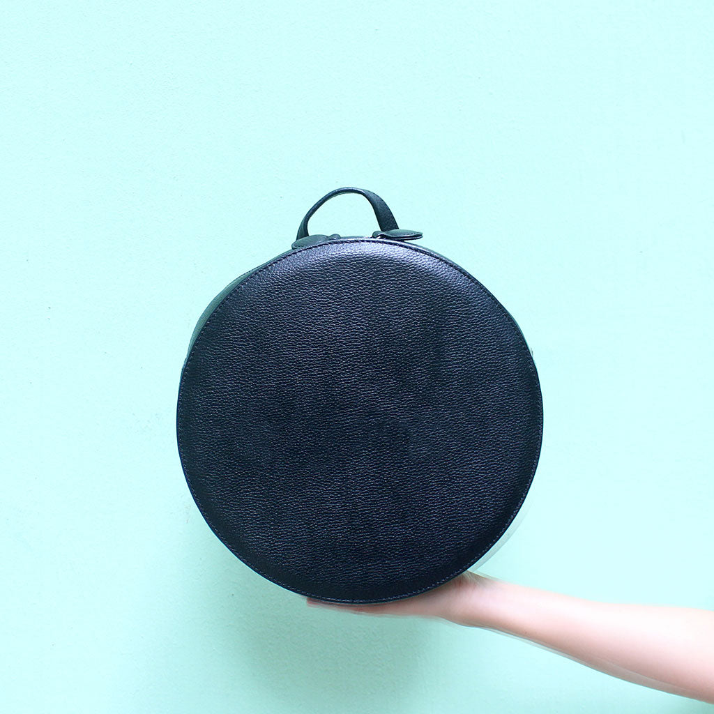 #ROLLROLLROLL Leather Round Backpack | TAT