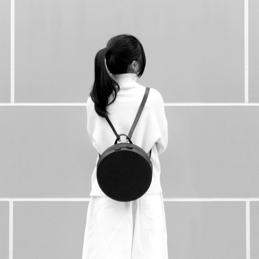 TAT_14595D_round backpack on model