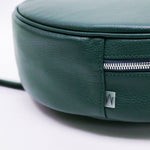 TAT_whysoserious_backpack_14595_olive_close up of silver tone zipper