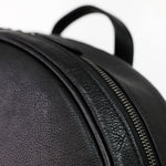 TAT_whysoserious_backpack_14595_black_front black nickel zipper close up