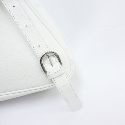 TAT_whysoserious_backpack_14596_white-shoulder belt buckle close up
