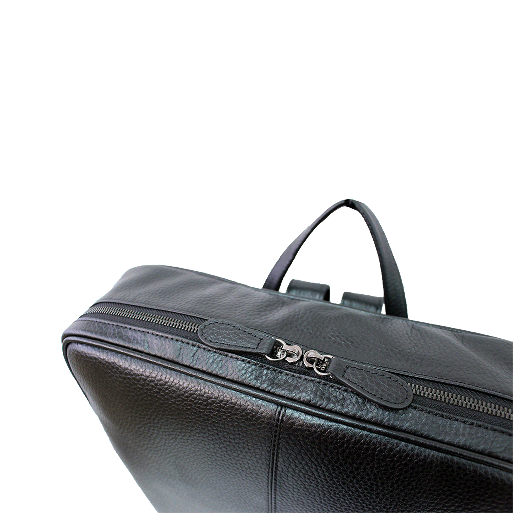 black square leather backpack top view with zipper