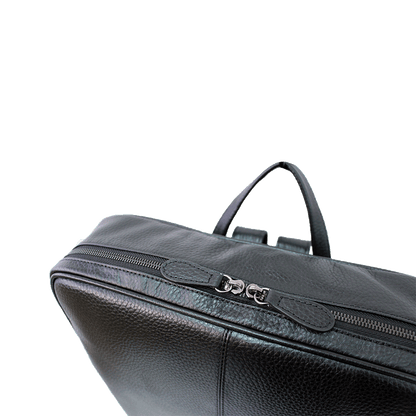 black square leather backpack top view with zipper