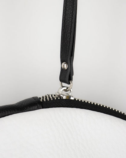 leather zipper puller close up