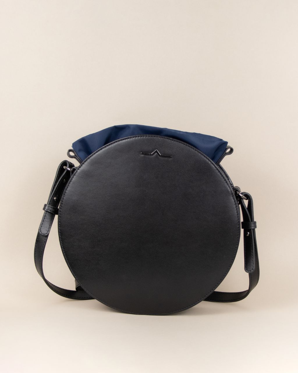 black circle cow leather crossbody with navy nylon beans bag set