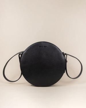 black circle cow leather crossbody bag front