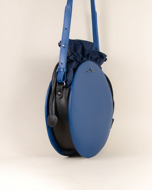 Blue round cow leather crossbody with nylon beans bag set side 
