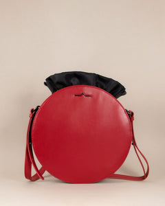Red round cow leather crossbody with blacknylon beans bag set