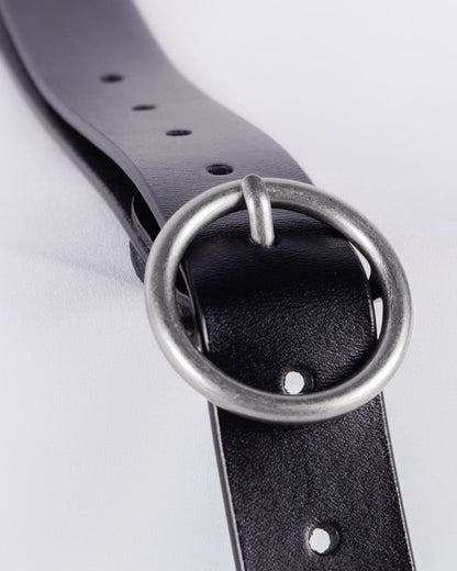 silver circle buckle finishing close up
